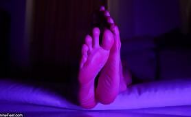 Carminefeet showing soles